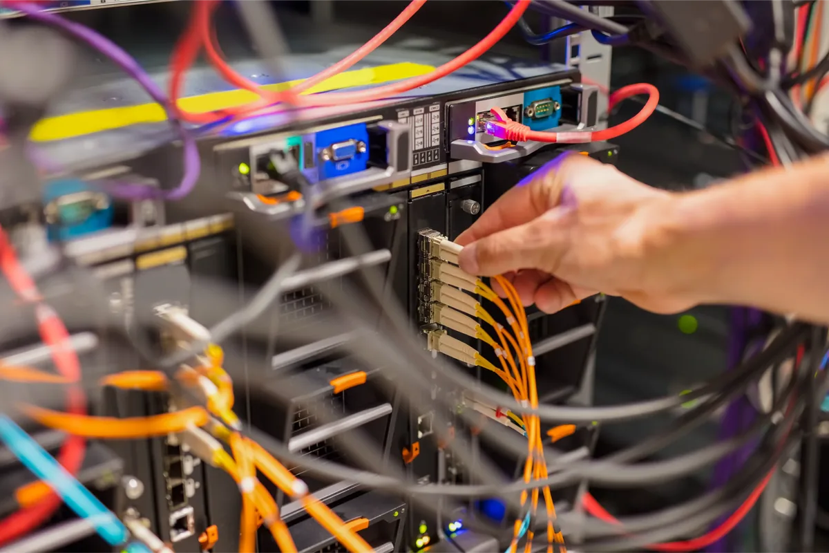 Network engineer connecting enterprise cabling